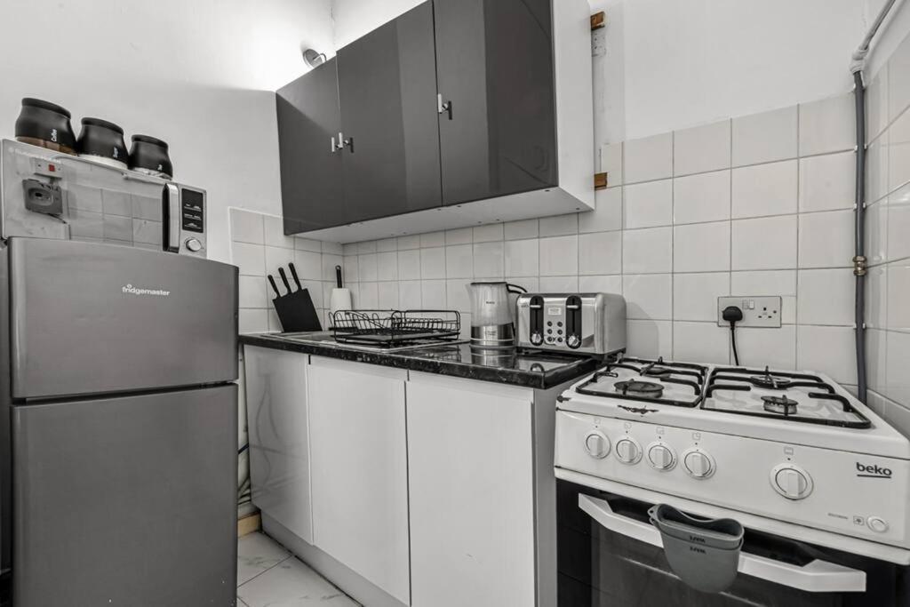 Appartamento Deluxe Flat On Kentish Town Londra Esterno foto